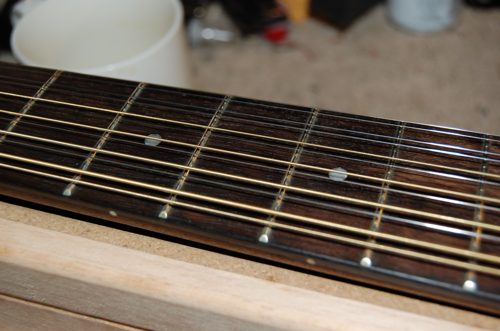 Frets and board cleaned oiled and ready for action