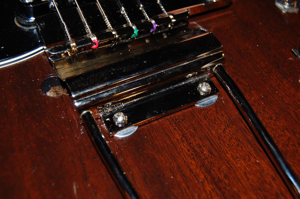 It seems bizarre but I had raise the rear of the tremolo a bit to drop the angle